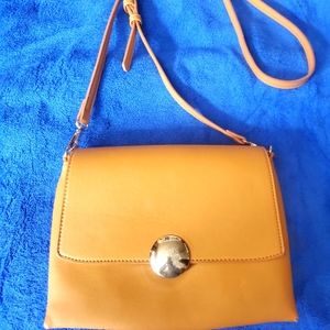 Miztique crossbody bag color yellow good condition color